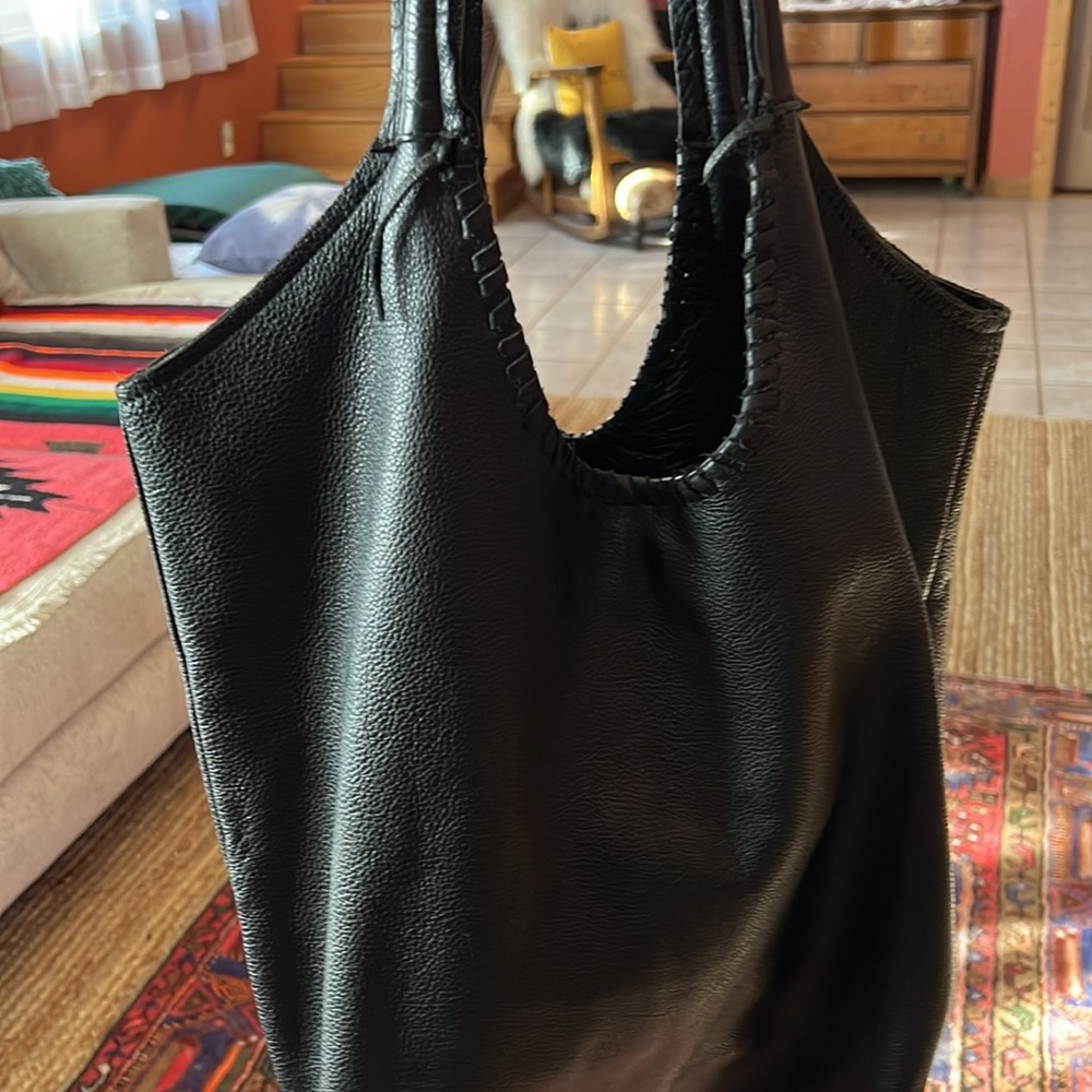 Jennifer Haley genuine leather bag.Dust bag included. Very good condition!